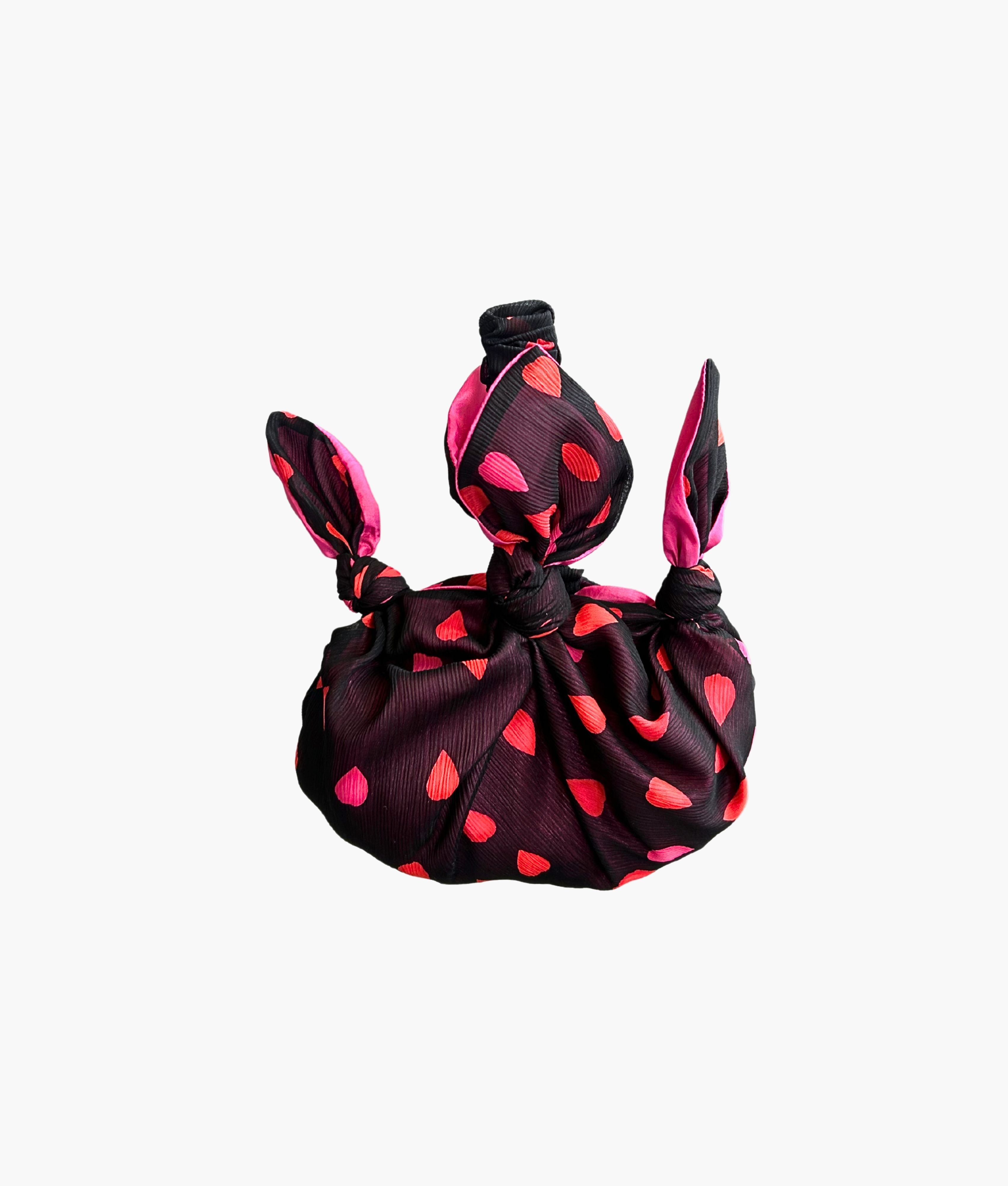 Baby furoshiki bag in black with petal print - cerise lining