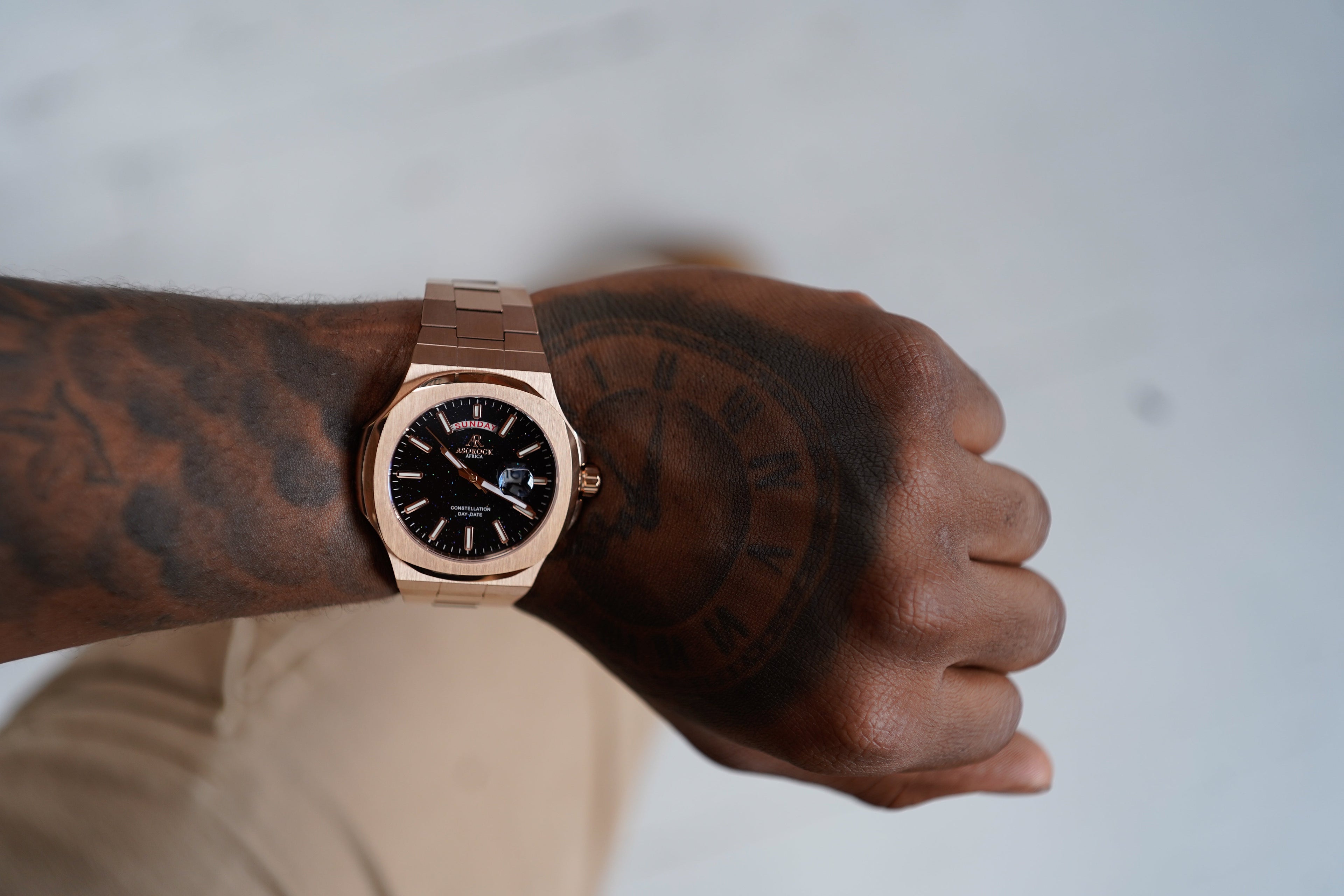 Rosegold/Black plain Constellation Day Date