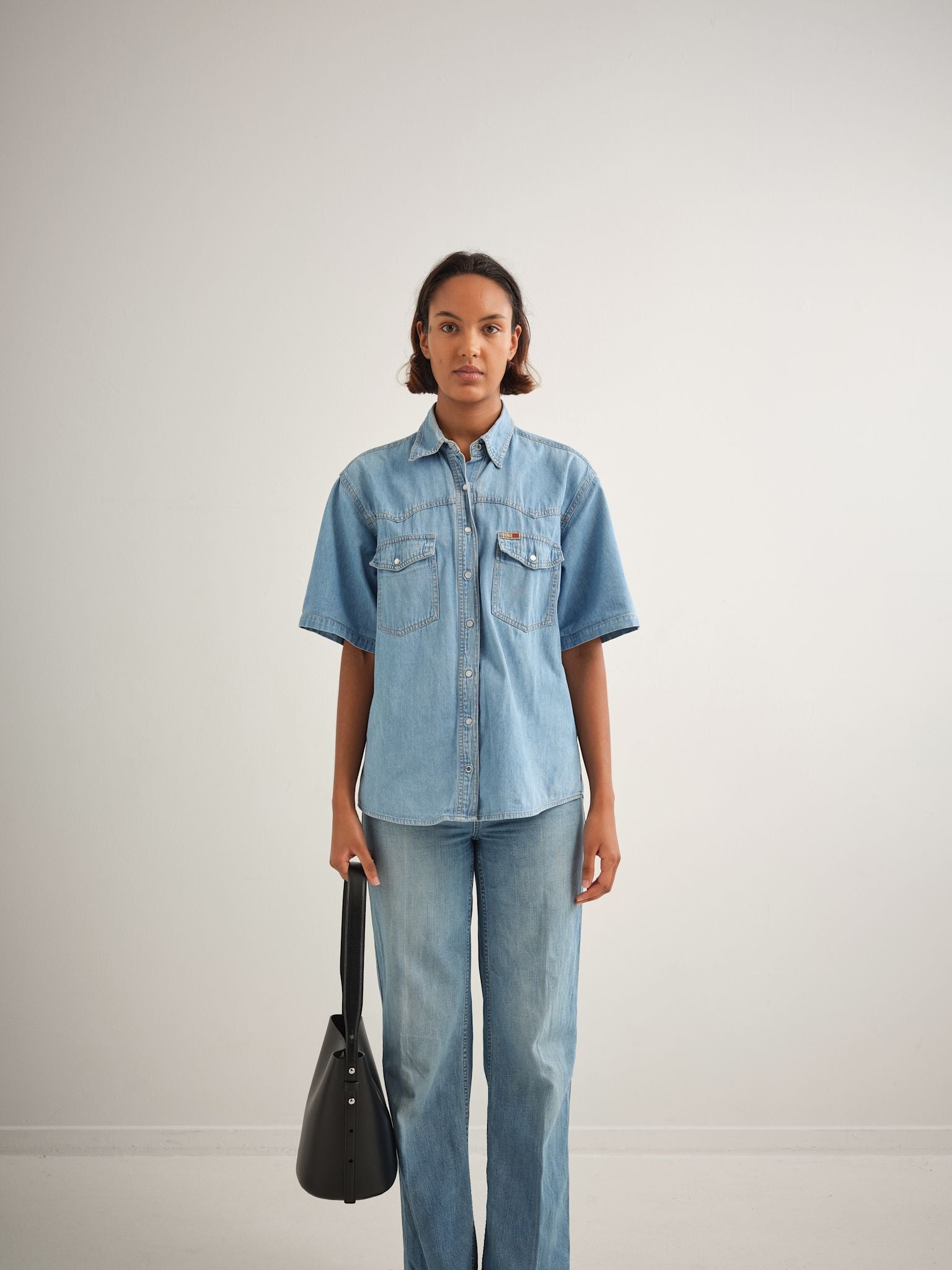 LITTLE LEO BUCKET BAG - BLACK VITELLO