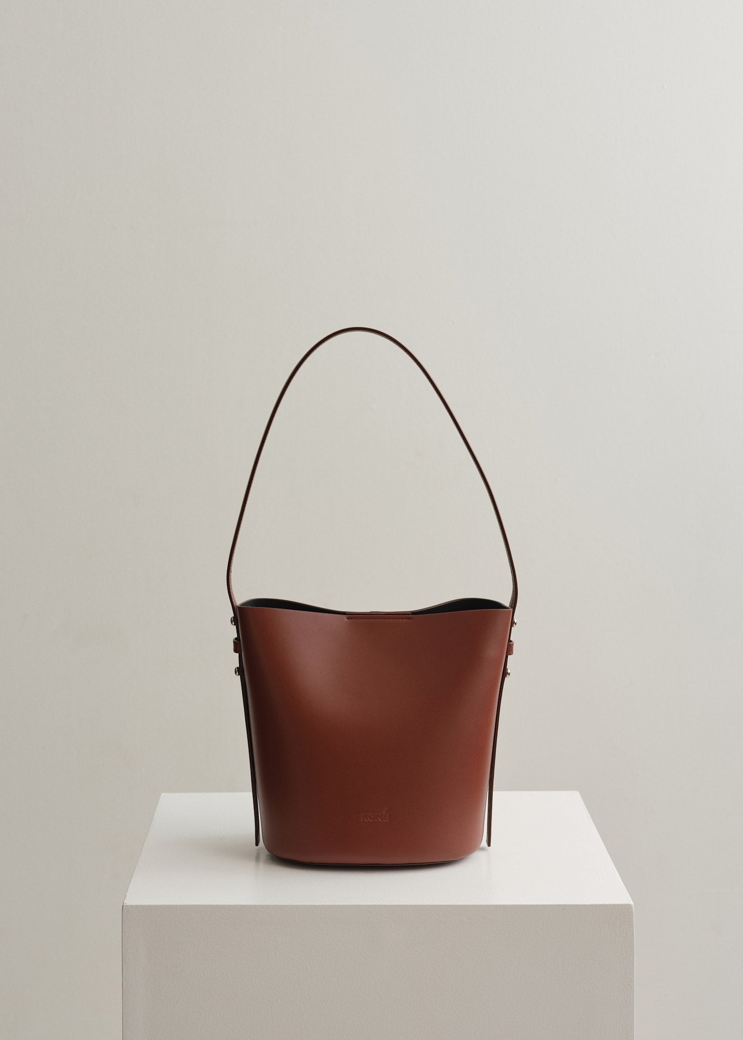 LITTLE LEO BUCKET BAG - RUSTY VITELLO