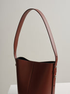 LITTLE LEO BUCKET BAG - RUSTY VITELLO